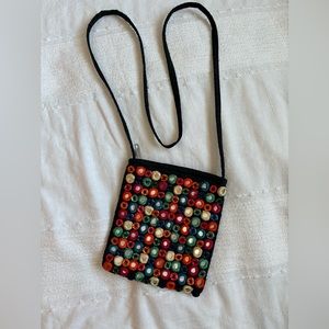 BOHO HIPPIE MINI CROSSBODY accessory bag with buttons and mirror accents.